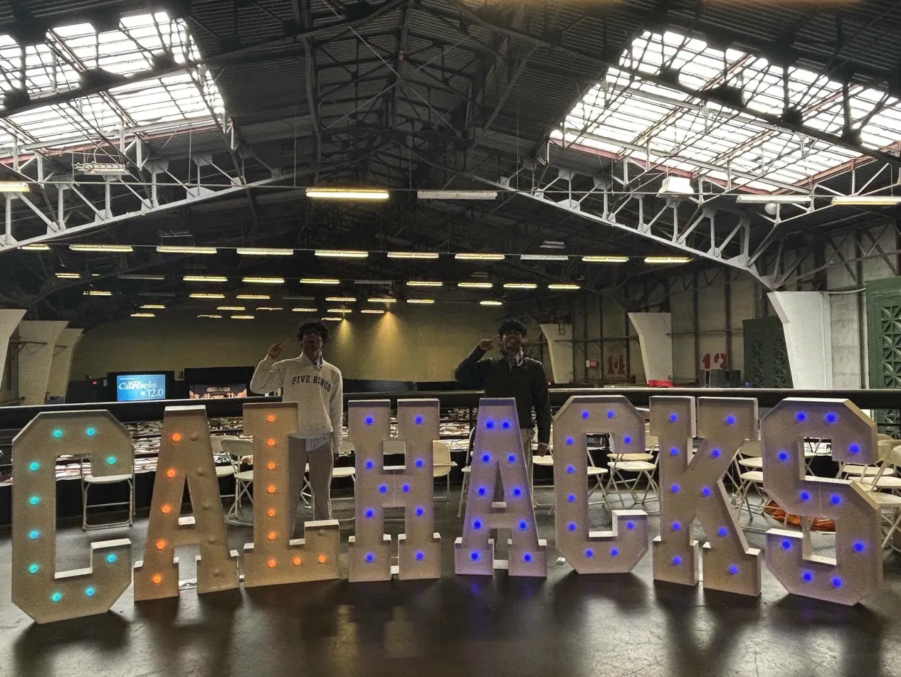 Ronok and Aryan at CalHacks 12.0 sign